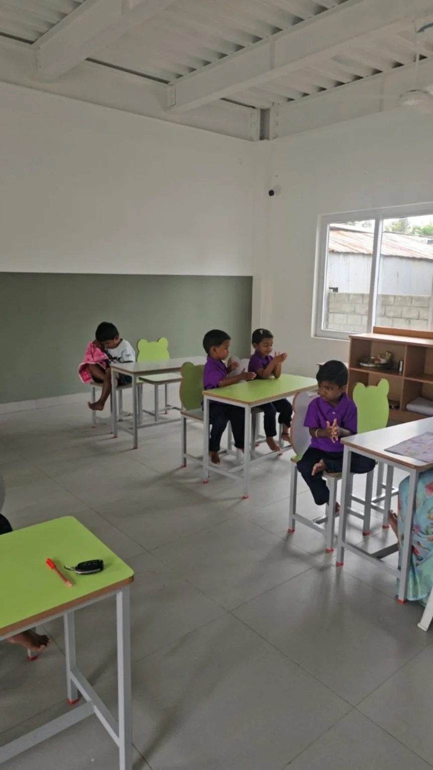 Purple Dots students learning in a classroom